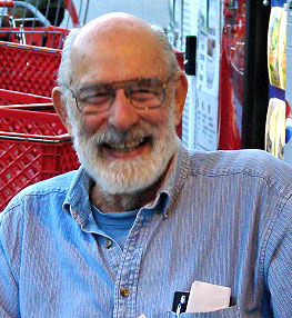 Bill Shoemaker at a KMUD fundraising table in 2008