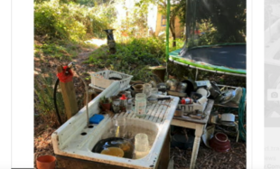 dirty outdoor kitchen area next to a trampoline