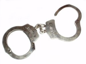 Police handcuff graphic arrest