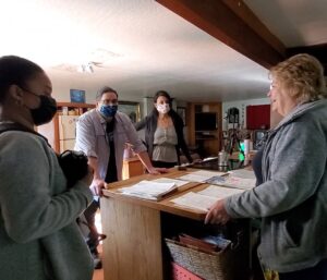 Peggy Hoaglin with Ca Natural Resources Agency staff copying documents (photo by kl)