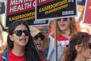 Stock photo of NUHW workers picketing