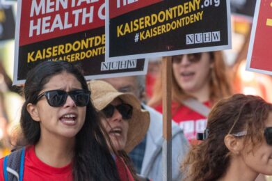 Stock photo of NUHW workers picketing